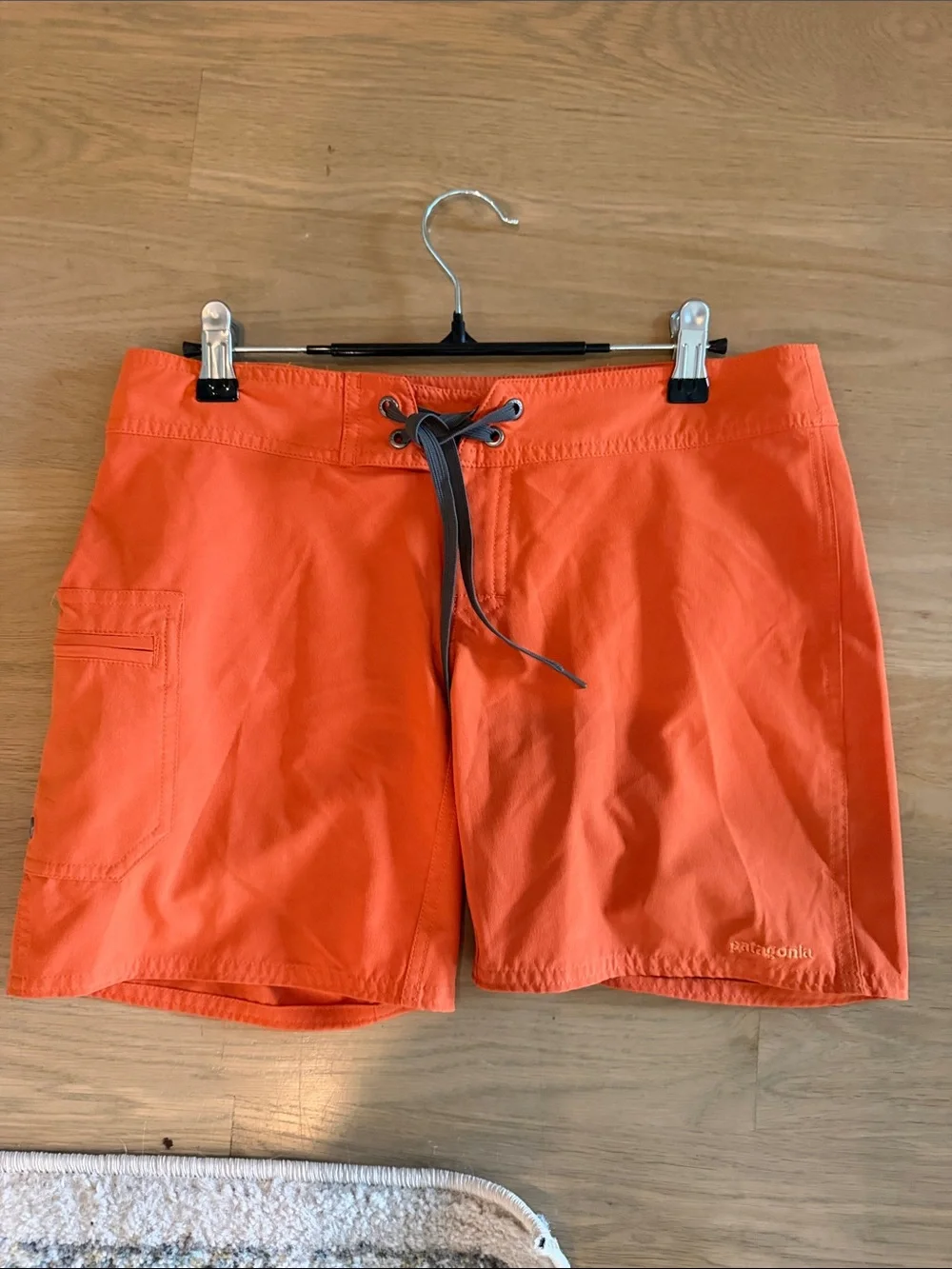 Patagonia Bright Orange Board Shorts with Gray Drawstring